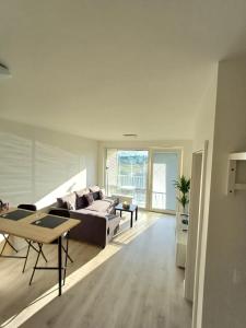 New air-conditioned apartment 5 minutes by walk from the airport with free garage parking
