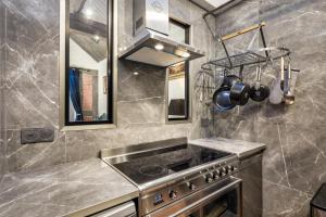 Villas Hameau du Chateau de Giverzac, gites luxueuses : photos des chambres