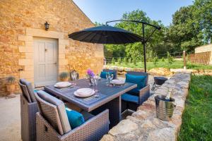 Villas Hameau du Chateau de Giverzac, gites luxueuses : photos des chambres