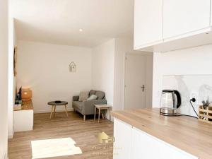 Appartements Le sans soucis, T2 contemporain : photos des chambres