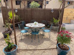 Maisons de vacances Maison sur cour et veranda : photos des chambres