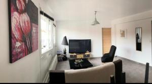 Bel appartement cosy très calme avec parking privé