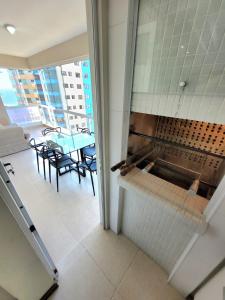 3 suítes grandes, 4 garagens, Vista mar, ótima localização a 2 minutos do mar em Meia Praia - Itapema