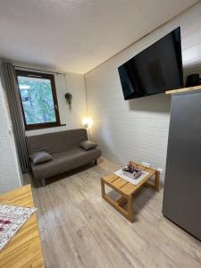 Appartements Studio cosy 1700 : photos des chambres