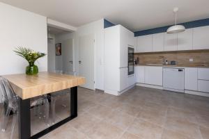 Appartements Saona - Charmant appt avec terrasse et jardin : photos des chambres