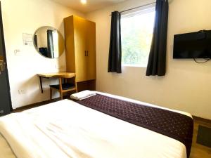 Qotel Comfort IP Residency East Delhi Preet Vihar