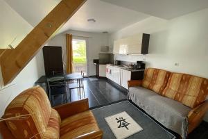 Appartements Appartement l’Aixquis chaleureux et moderne : photos des chambres