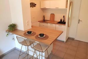 Appartements Appart avec jardin a 300m de la plage Classe * * : photos des chambres