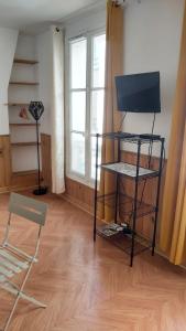 Appartements STUDIO RUE GAUTHEY PARIS 17 : photos des chambres