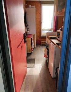 Appartements Le petit Nid Rouge : photos des chambres