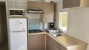 Campings Le Phare d'Opale IV, G6 : Bungalow - Bord de l'Eau
