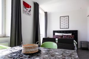 Appart'hotels LA BATISSE l'arbre gris : photos des chambres