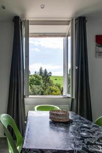 Appart'hotels LA BATISSE l'arbre gris : photos des chambres