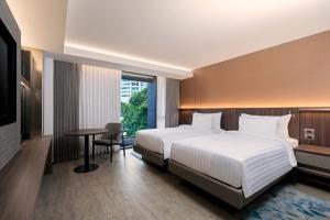 Phòng Hai Giường Đơn Loại Sang (Deluxe Twin Room)