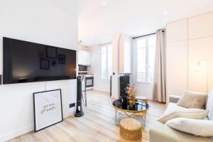 Appartements GuestReady - Charm stay in Courbevoie : photos des chambres