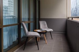 Executive Urban Living with Balcony & Heated Pool
