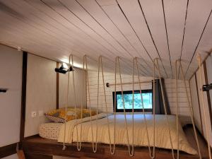 Maisons de vacances Tiny house lumen : photos des chambres