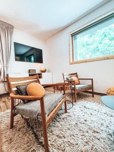 Appartements Le Peyra, Apt 4 personnes avec terrasse et jardin : photos des chambres