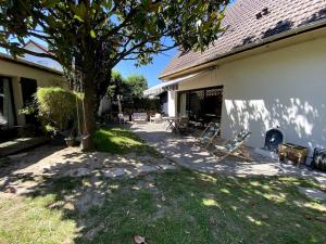 Villas Maison familiale avec jardin : photos des chambres