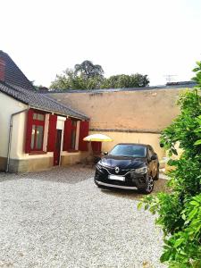 Appartements Gite Aux Anciennes Ecuries : photos des chambres