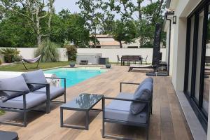 Sejours chez l'habitant Chambre au calme ocean lac foret avec piscine au sel et spa : photos des chambres