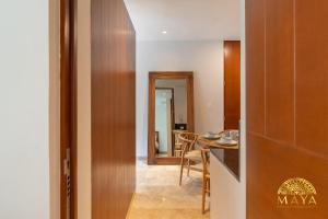 NHOA 208A Lux 2BR Condo Jungle View in Aldea Zama