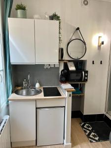 Appartements Le Cosy, charmant studio centre ville : photos des chambres