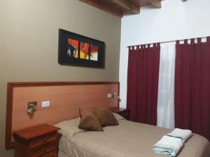 EL OASIS Habitaciones