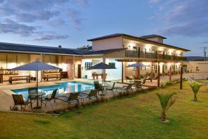 Flat Charme do Cerrado - Até 4 pessoasCozinhaAr Cond.Piscina