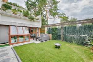 Appartements Le 44 - Appt avec jardin prive : photos des chambres