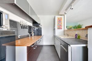 Appartements Le 44 - Appt avec jardin prive : photos des chambres