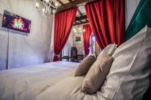 Appartements LE MOLIERE - ENIGME ET SAUNA : photos des chambres