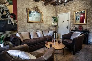 Appartements LE MOLIERE - ENIGME ET SAUNA : photos des chambres