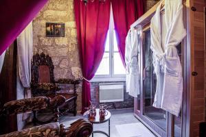 Appartements LE MOLIERE - ENIGME ET SAUNA : photos des chambres