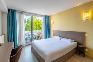 Studio with Balcony room in Les Loges Du Park - Résidence Hôtelière