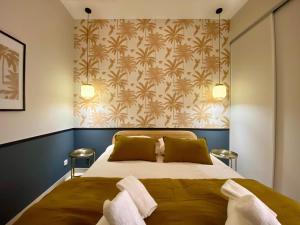 Appartements L'improbable rendez-vous : photos des chambres