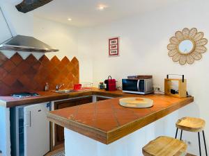 Appartements Appart Karibu : photos des chambres