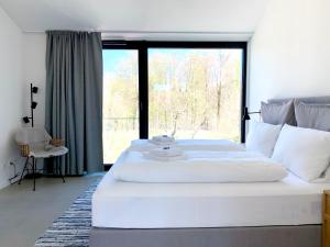 De ole School Ferienapartments Hohwacht Maisonette-Apartment 06 , Huus Stranden