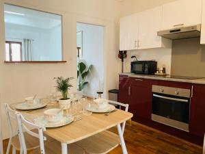 Appartements Le Blue - Coeur de ville : photos des chambres