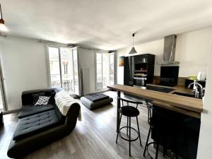 Appartements Logements situes en plein coeur de ville avec jardin : photos des chambres