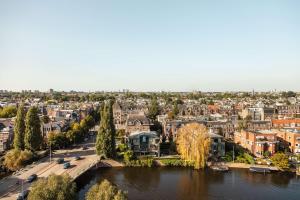 King Junior Suite Canal View room in Hilton Amsterdam