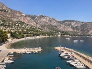 Appartements Un coin de paradis avec vue Mer et jardin : photos des chambres