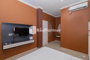 Star Hotel Jaksa Mitra RedDoorz