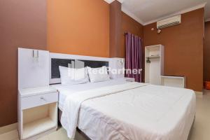 Star Hotel Jaksa Mitra RedDoorz