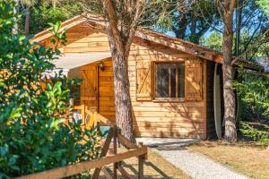 Appartements La maisonnette en bois : photos des chambres