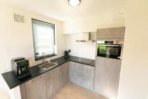 Goldenescape 6P Vrijstaand Huis met royale tuin en Hottub