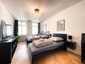 Zentrale Ferienwohnung mit Parkplatz, 2 Schlafzimmern, Küche, Waschmaschine & Balkon