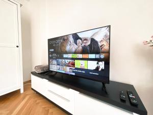 Zentrale Ferienwohnung mit Parkplatz, 2 Schlafzimmern, Küche, Waschmaschine & Balkon