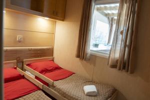 Appartements Mobilhome tout equipe : photos des chambres