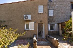 Maisons de vacances Tozza Alta - Maison climatisee avec jardin : photos des chambres